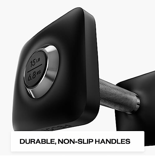 Close-up of a durable, non-slip dumbbell handle weighing 15 lb or 6.8 kg.