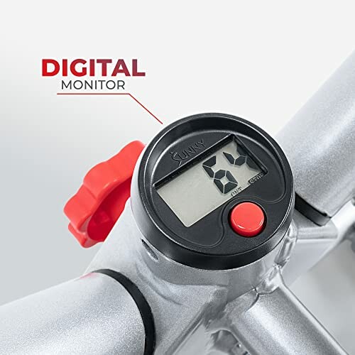 Close-up of an exercise bike digital monitor displaying 62 with a red knob.